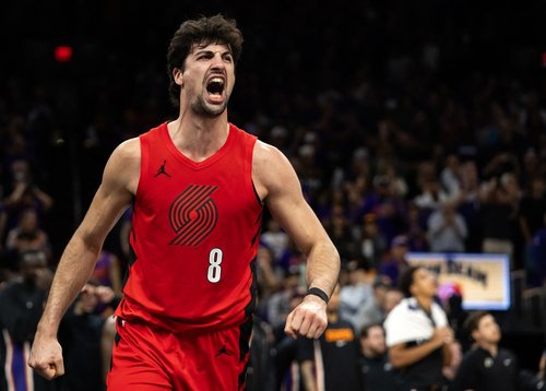 Apr 14, 2026; Phoenix, Arizona, USA; Portland Trail Blazers forward Deni Avdija (8) celebrates against the Phoenix Suns in the second half during the play-in rounds of the 2026 NBA Playoffs at Mortgage Matchup Center. Mandatory Credit: Mark J. Rebilas-Ima