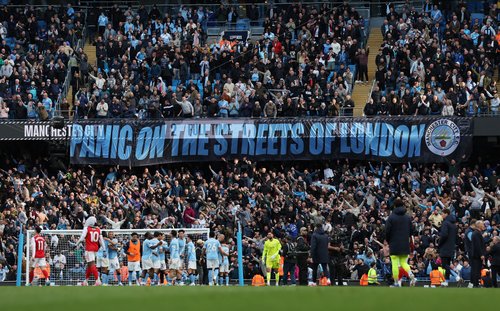 Soccer Football - Premier League - Manchester City v Arsenal - Etihad Stadium, Manchester, Britain - April 19, 2026 Manchester City fans celebrate after the match REUTERS/Scott Heppell EDITORIAL USE ONLY. NO USE WITH UNAUTHORIZED AUDIO, VIDEO, DATA, FIXTU