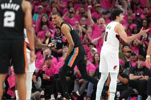 Apr 19, 2026; San Antonio, Texas, USA; San Antonio Spurs forward Victor Wembanyama (1) reacts after drawing a foul while scoring a basket during the second half of game one of the first round of the 2026 NBA Playoffs against the Portland Trail Blazers at