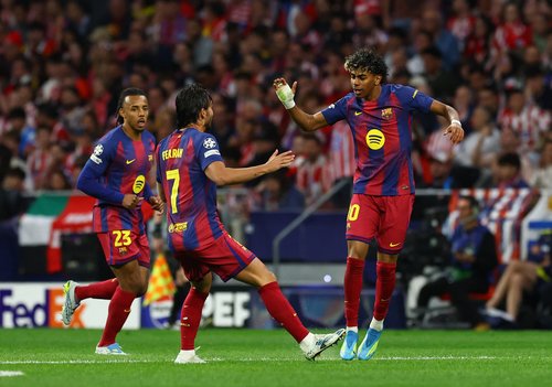 Soccer Football - UEFA Champions League - Quarter Final - Second Leg - Atletico Madrid v FC Barcelona - Riyadh Air Metropolitano, Madrid, Spain - April 14, 2026 FC Barcelona's Lamine Yamal celebrates scoring their first goal with Ferran Torres REUTERS/Alb