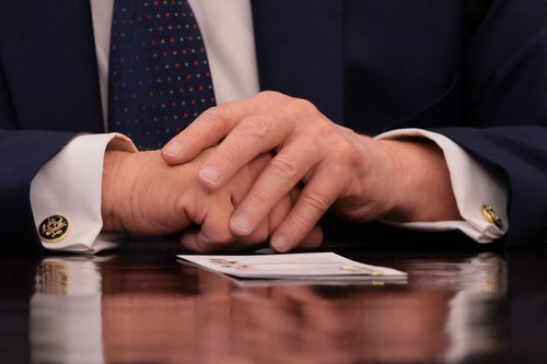 Detail on the hands of U.S. President Donald Trump