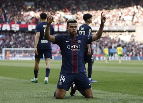 Soccer Football - Ligue 1 - Paris St Germain v FC Nantes - Parc des Princes, Paris, France - April 22, 2026 Paris St Germain's Desire Doue celebrates scoring their second goal REUTERS/Benoit Tessier