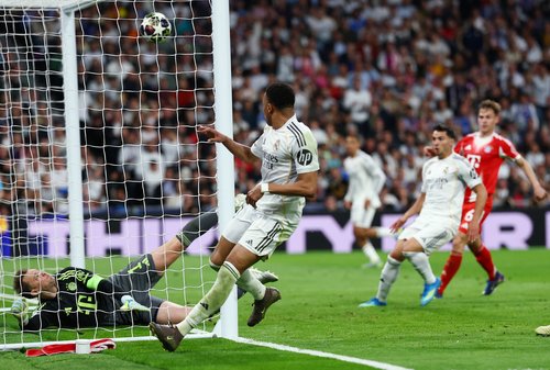 Soccer Football - UEFA Champions League - Quarter Final - First Leg - Real Madrid v Bayern Munich - Santiago Bernabeu, Madrid, Spain - April 7, 2026 Real Madrid's Kylian Mbappe scores their first goal REUTERS/Gonzalo Fuentes