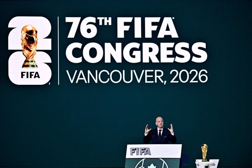 Soccer Football - 76th FIFA Congress - Vancouver Convention Centre, Vancouver, Canada - April 30, 2026 FIFA President Gianni Infantino speaks during the congress as the FIFA World Cup Trophy is seen REUTERS/Jennifer Gauthier TPX IMAGES OF THE DAY