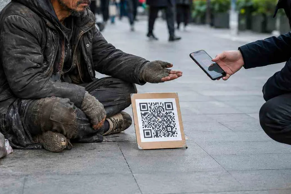 Država u kojoj je gotovina praktično nestala prije 10 godina, čak i beskućnici koriste QR kodove kada prose