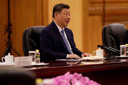 China's President Xi Jinping attends a meeting with Spain's
