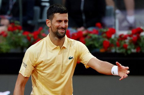 FILE PHOTO: Tennis - Italian Open - Foro Italico, Rome, Italy - May 8, 2026 Serbia's Novak Djokovic reacts during his second round match against Croatia's Dino Prizmic REUTERS/Ciro De Luca/File Photo