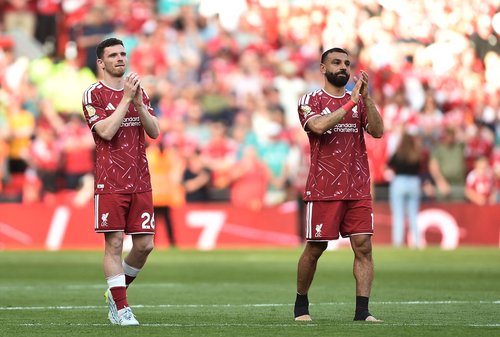 Soccer Football - Premier League - Liverpool v Brentford - Anfield, Liverpool, Britain - May 24, 2026 Liverpool's Andrew Robertson and Mohamed Salah applaud the fans after playing their last match for the club REUTERS/Peter Powell EDITORIAL USE ONLY. NO U