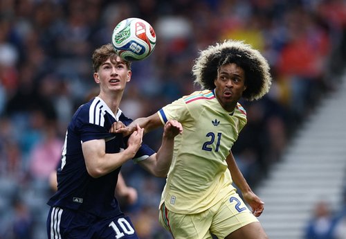 Soccer Football - International Friendly - Scotland v Curacao - Hampden Park, Glasgow, Scotland, Britain - May 30, 2026 Curacao's Tahith Chong in action with Scotland's James Wilson Action Images via Reuters/Lee Smith