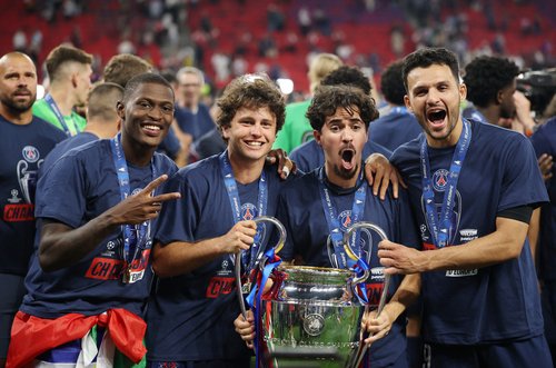 Soccer Football - UEFA Champions League - Final - Paris St Germain v Arsenal - Puskas Arena, Budapest, Hungary - May 30, 2026 Paris St Germain's Nuno Mendes, Joao Neves, Vitinha and Goncalo Ramos celebrate with the trophy after winning the UEFA Champions