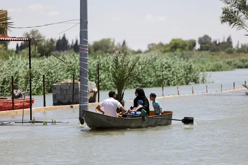 2026-05-30T115259Z_1658629319_RC2KJLASR4MV_RTRMADP_3_SYRIA-DEIR-AL-ZOR-EUPHRATES-FLOOD.JPG