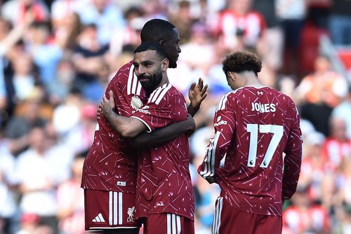 Soccer Football - Premier League - Liverpool v Brentford - Anfield, Liverpool, Britain - May 24, 2026 Liverpool's Mohamed Salah embraces Ibrahima Konate as he walks off the pitch after being substituted REUTERS/Peter Powell EDITORIAL USE ONLY. NO USE WITH