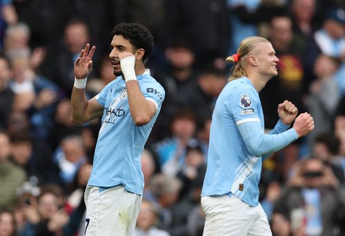 Soccer Football - Premier League - Manchester City v Brentford - Etihad Stadium, Manchester, Britain - May 9, 2026 Manchester City's Omar Marmoush celebrates scoring their third goal with Manchester City's Erling Haaland REUTERS/Chris Radburn EDITORIAL US
