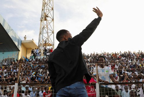 Somali referee Omar Abdulkadir Artan, who was expected to officiate at matches during the 2026. FIFA World Cup but was denied entry to U.S., waves towards fans at the Mogadishu stadium, in Mogadishu, Somalia, June 10, 2026. REUTERS/Feisal Omar TPX IMA