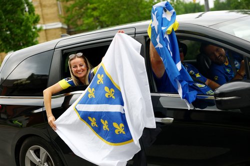 Soccer Football - FIFA World Cup 2026 - Group B - Canada v Bosnia and Herzegovina - Toronto Stadium, Toronto, Canada - June 12, 2026 Bosnia and Herzegovina fans with flags outside the stadium before the match IMAGN IMAGES via Reuters/Claudia Greco