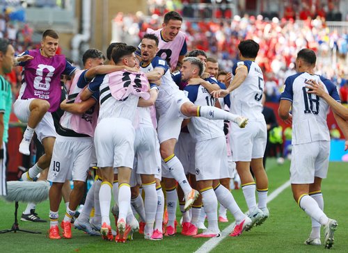 Soccer Football - FIFA World Cup 2026 - Group B - Canada v Bosnia and Herzegovina - Toronto Stadium, Toronto, Canada - June 12, 2026 Bosnia and Herzegovina's Jovo Lukic celebrates scoring their first goal with teammates REUTERS/Claudia Greco