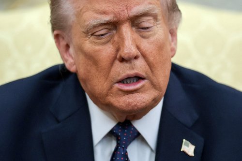 FILE PHOTO: U.S. President Donald Trump speaks as he meets with German Chancellor Friedrich Merz (not pictured) in the Oval Office at the White House in Washington, D.C., U.S., March 3, 2026. REUTERS/Jonathan Ernst/File Photo