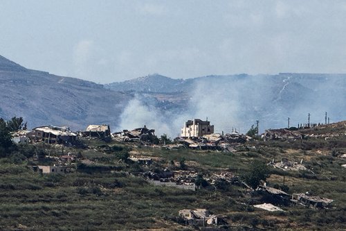 Smoke rises near destroyed structures in southern Lebanon, as seen from the Israeli side of the Israel-Lebanon border, in northern Israel, June 14, 2026. Picture taken with a mobile phone. REUTERS/Avi Ohayon