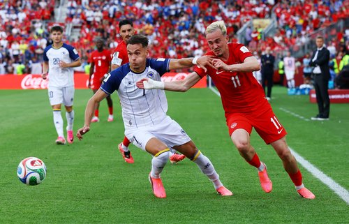 Soccer Football - FIFA World Cup 2026 - Group B - Canada v Bosnia and Herzegovina - Toronto Stadium, Toronto, Canada - June 12, 2026 Bosnia and Herzegovina's Amar Dedic in action with Canada's Liam Millar REUTERS/Bernadett Szabo