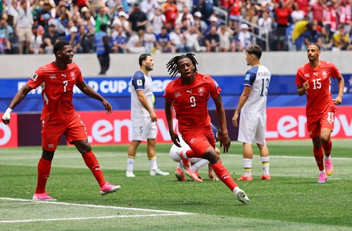 Soccer Football - FIFA World Cup 2026 - Group B - Switzerland v Bosnia and Herzegovina - Los Angeles Stadium, Inglewood, California, U.S. - June 18, 2026 Switzerland's Johan Manzambi celebrates scoring their first goal with Breel Embolo REUTERS/Daniel Col