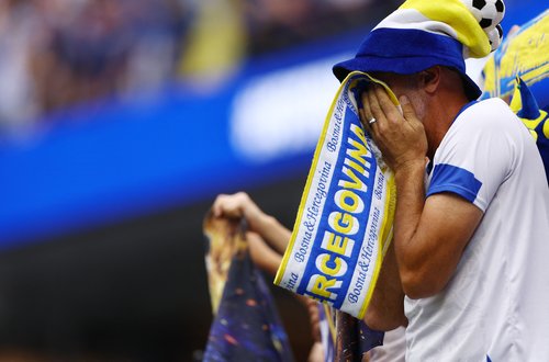 Soccer Football - FIFA World Cup 2026 - Group B - Switzerland v Bosnia and Herzegovina - Los Angeles Stadium, Inglewood, California, U.S. - June 18, 2026 Bosnia and Herzegovina fan reacts REUTERS/Lisi Niesner