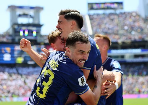Soccer Football - FIFA World Cup 2026 - Group B - Bosnia and Herzegovina v Qatar - Seattle Stadium, Seattle, Washington, U.S. - June 24, 2026 Bosnia and Herzegovina's Ermin Mahmic celebrates scoring their third goal with Dennis Hadzikadunic and Ivan Basic