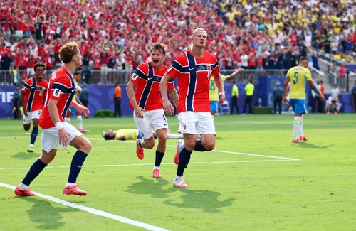 Soccer Football - FIFA World Cup 2026 - Round of 16 - Brazil v Norway - New York New Jersey Stadium, East Rutherford, New Jersey, U.S. - July 5, 2026 Norway's Erling Haaland celebrates scoring their first goal with David Moller Wolfe and Andreas Schjelder