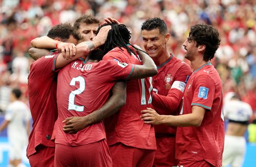 Soccer Football - FIFA World Cup 2026 - Group K - Portugal v Uzbekistan - Houston Stadium, Houston, Texas, U.S. - June 23, 2026 Portugal's Rafael Leao celebrates scoring their fifth goal with teammates REUTERS/Phil Noble