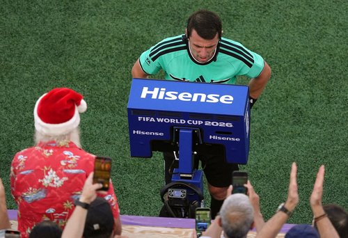 Soccer Football - FIFA World Cup 2026 - Round of 16 - Paraguay v France - Philadelphia Stadium, Philadelphia, Pennsylvania, U.S. - July 4, 2026 Referee Ilgiz Tantashev refers to VAR before awarding a penalty to France IMAGN IMAGES via Reuters/Kyle Ross