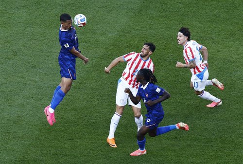 Soccer Football - FIFA World Cup 2026 - Round of 16 - Paraguay v France - Philadelphia Stadium, Philadelphia, Pennsylvania, U.S. - July 4, 2026 France's William Saliba in action with Paraguay's Gabriel Avalos REUTERS/Jeenah Moon