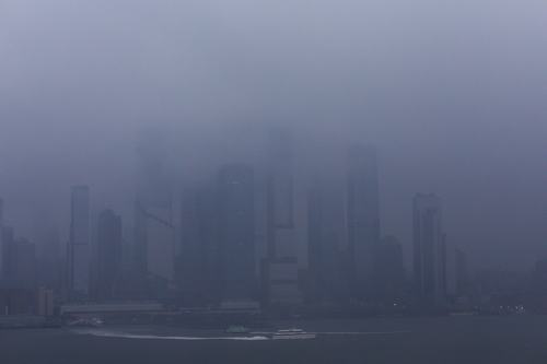 A ferry boat moves along the Hudson River during a rain storm in New York City, U.S., June 22, 2026. REUTERS/Eduardo Munoz
