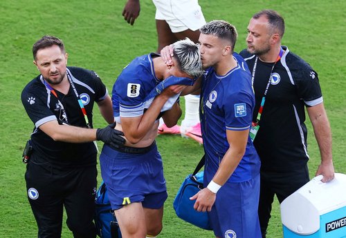 Soccer Football - FIFA World Cup 2026 - Round of 32 - United States v Bosnia and Herzegovina - San Francisco Bay Area Stadium, Santa Clara, California, U.S. - July 1, 2026 Bosnia and Herzegovina's Tarik Muharemovic reacts after sustaining an injury follow