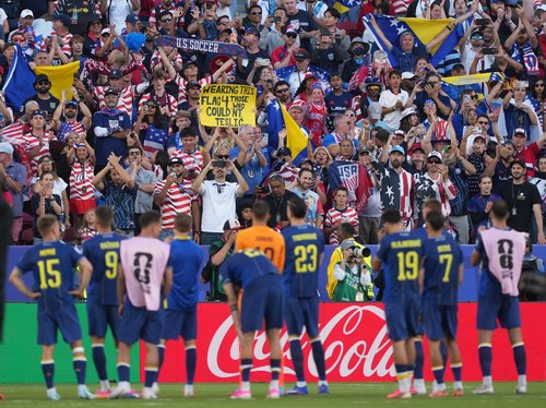 2026-07-Soccer Football - FIFA World Cup 2026 - Round of 32 - United States v Bosnia and Herzegovina - San Francisco Bay Area Stadium, Santa Clara, California, U.S. - July 1, 2026 Fans take photos as Bosnia and Herzegovina players acknowl-WORLDCUP-USA-BIH