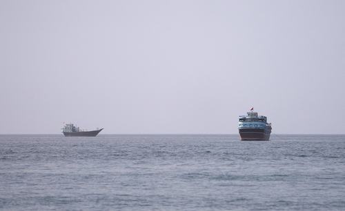 FILE PHOTO: Vessels at the Strait of Hormuz, as seen from Musandam, Oman, July 17, 2026. REUTERS/Stringer/File Photo
