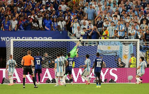 Soccer Football - FIFA World Cup 2026 - Round of 32 - Argentina v Cape Verde - Miami Stadium, Miami Gardens, Florida, U.S. - July 3, 2026 Argentina's Emiliano Martinez saves a shot by Cape Verde's Sidny Lopes Cabral IMAGN IMAGES via Reuters/Sam Navarro