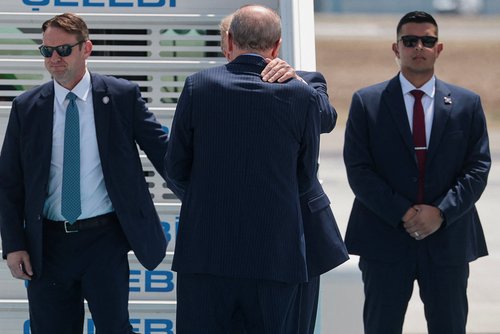 U.S. President Donald Trump is greeted by Turkish President Tayyip Erdogan