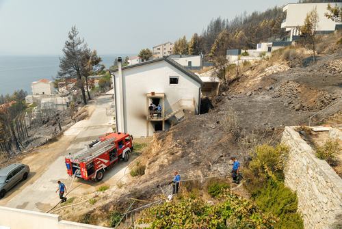 Firefighters work following wildfire in Stanici, Croatia, August 14, 2026. REUTERS/Antonio Bronic