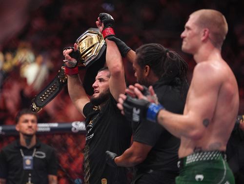 Aug 15, 2026; Philadelphia, Pennsylvania, USA; Islam Makhachev (red gloves) celebra