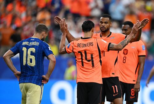 Soccer Football - FIFA World Cup 2026 - Group F - Netherlands v Sweden - Houston Stadium, Houston, Texas, U.S. - June 20, 2026 Netherlands' Cody Gakpo celebrates scoring their fourth goal with Tijjani Reijnders REUTERS/Annegret Hilse