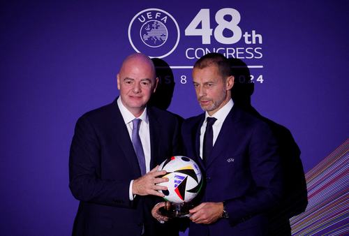 FILE PHOTO: Soccer Football - UEFA Congress - Maison de la Mutualite, Paris, France - February 8, 2024 FIFA president Gianni Infantino and UEFA president Aleksander Ceferin during the UEFA Congress REUTERS/Gonzalo Fuentes/File Photo