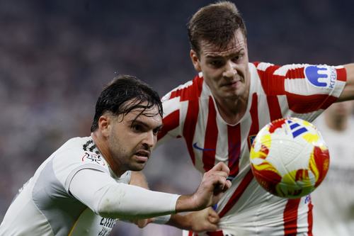 Soccer - Spanish Super Cup - Semi Final - Atletico Madrid v Real Madrid - King Abdullah Sports City, Jeddah, Saudi Arabia - January 8, 2026 Real Madrid's Raul Asencio in action with Atletico Madrid's Alexander Sorloth REUTERS/Vincent West