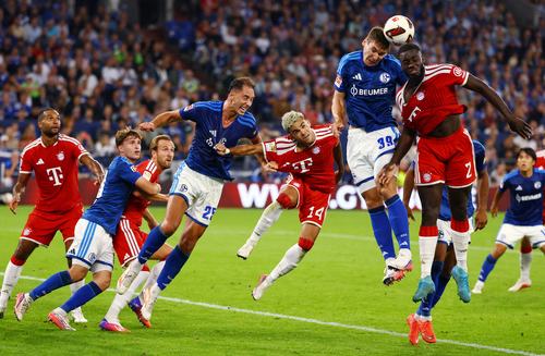 Soccer Football - Bundesliga - Schalke 04 v Bayern Munich - Veltins-Arena, Gelsenkirchen, Germany - September 5, 2026 Bayern Munich's Dayot Upamecano in action with Schalke 04's Maximilian Wober REUTERS/Kai Pfaffenbach DFL REGULATIONS PROHIBIT ANY USE OF