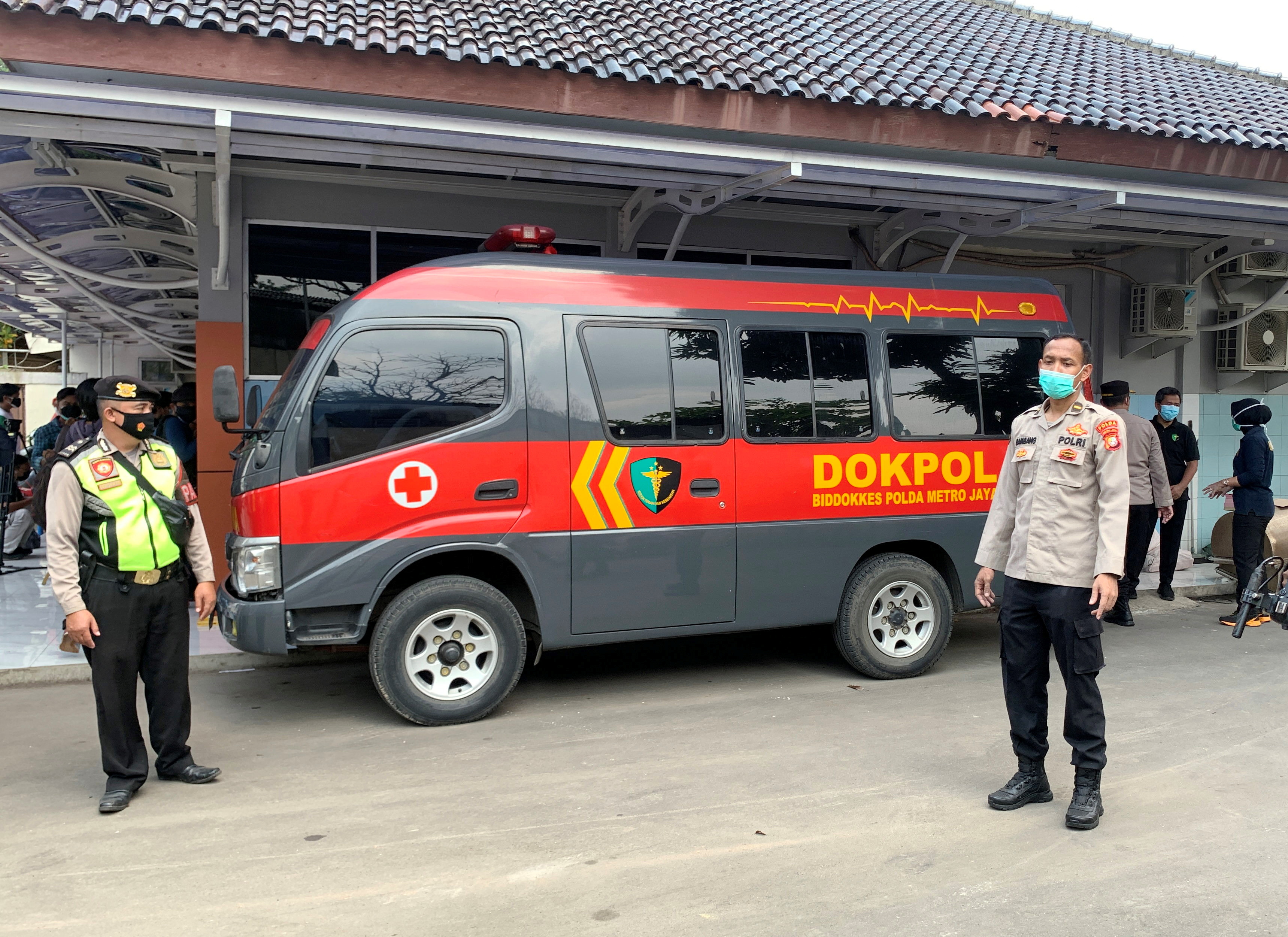 A police vehicle is seen outside Tangerang Hospital in Indonesia