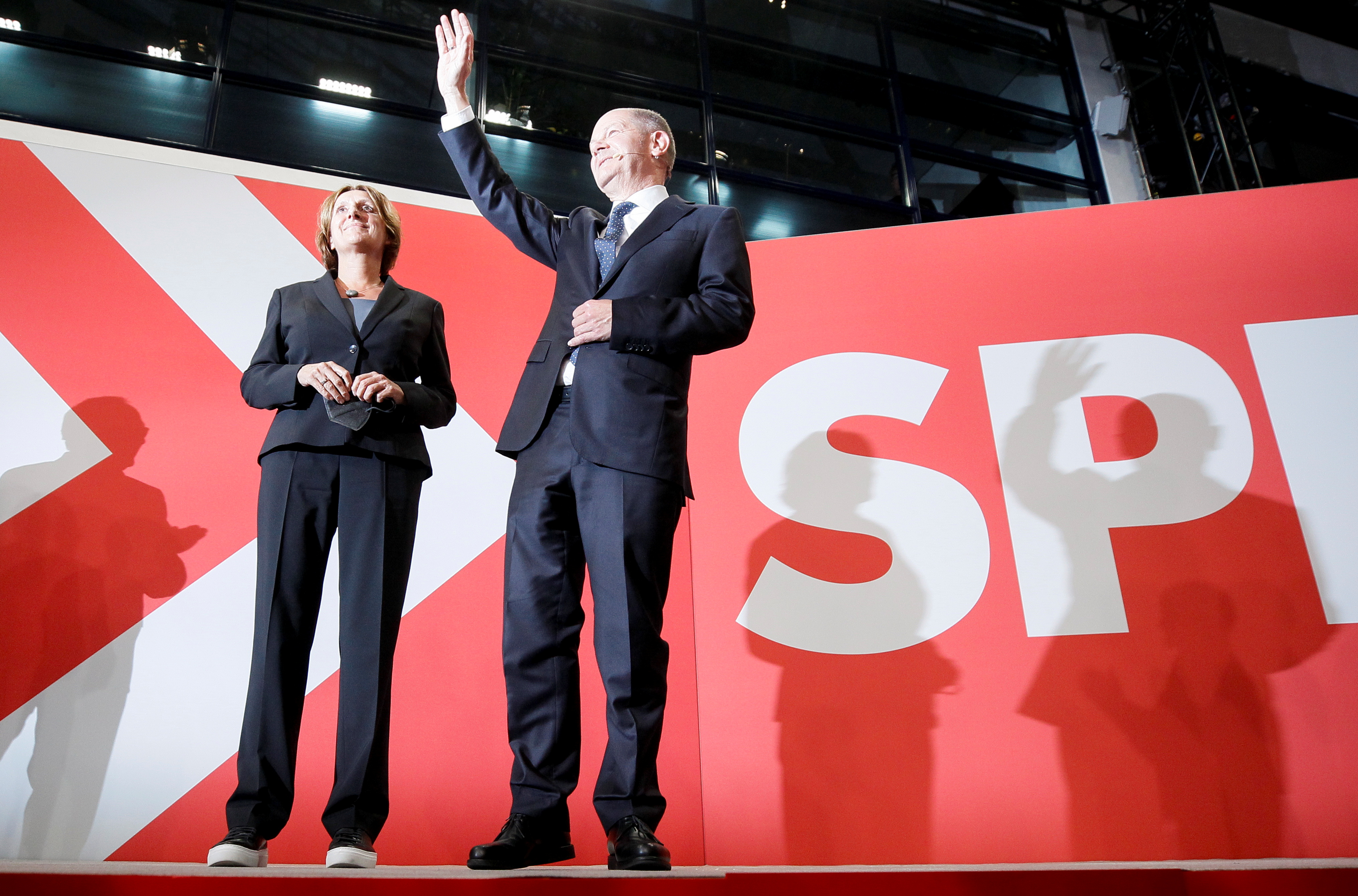 Reactions to the first exit polls from Social Democratic Party candidate Olaf Scholz and supporters at the party headquarters