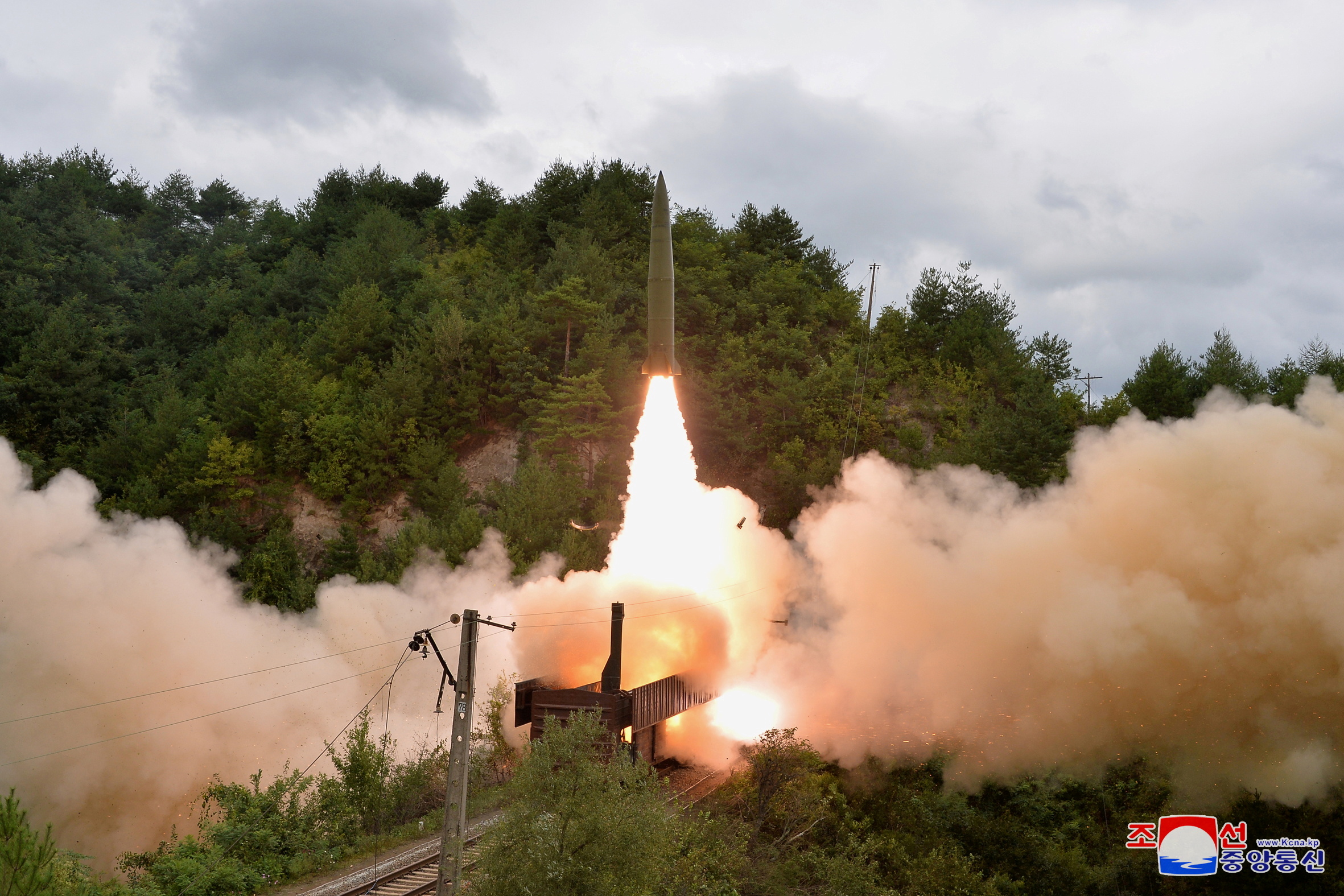 FILE PHOTO: A missile is seen launched during a drill of the Railway Mobile Missile Regiment in North Korea