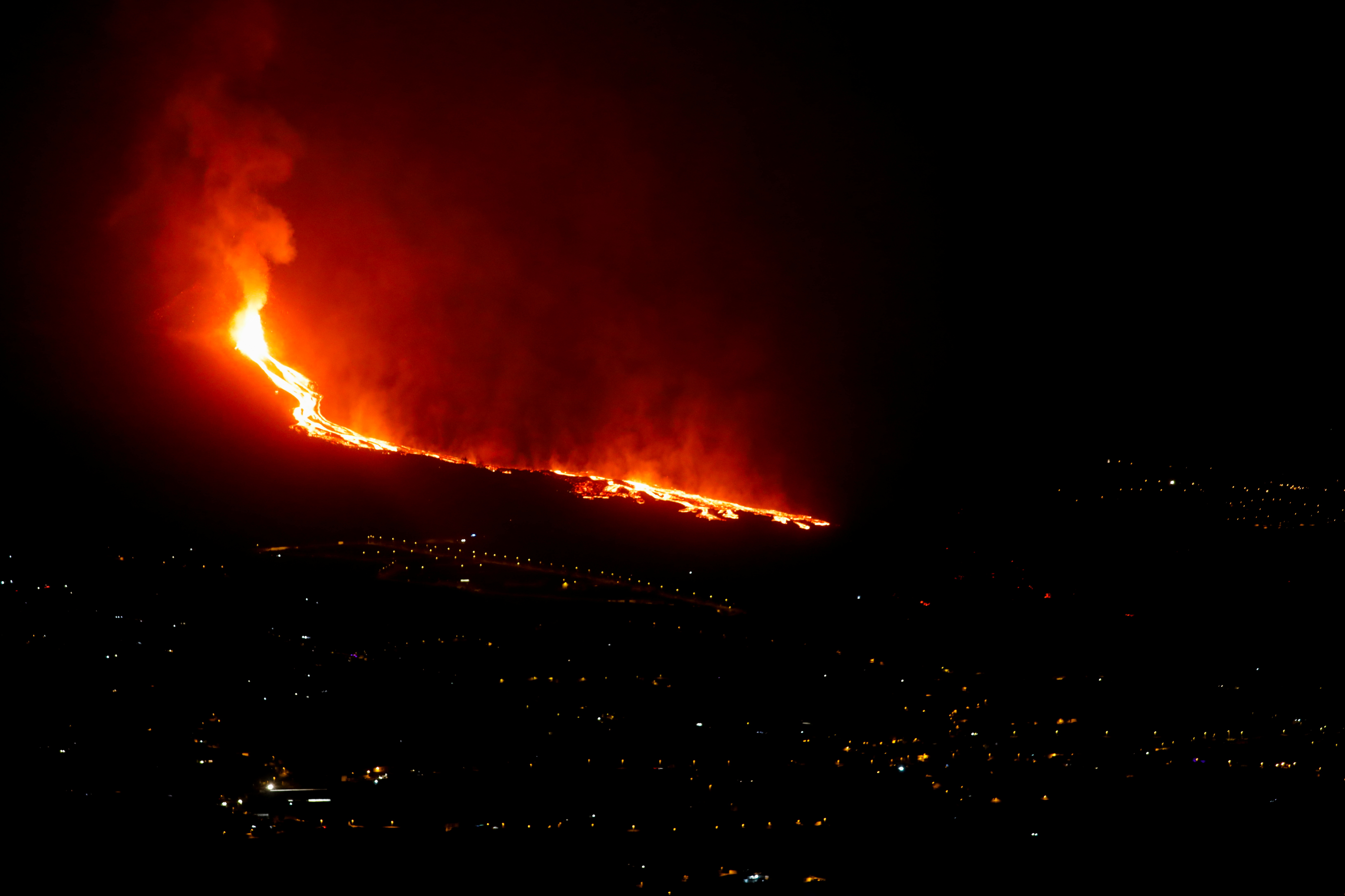 Lava is seen from Tijarafe following the eruption of a volcano on the Canary Island of La Palma