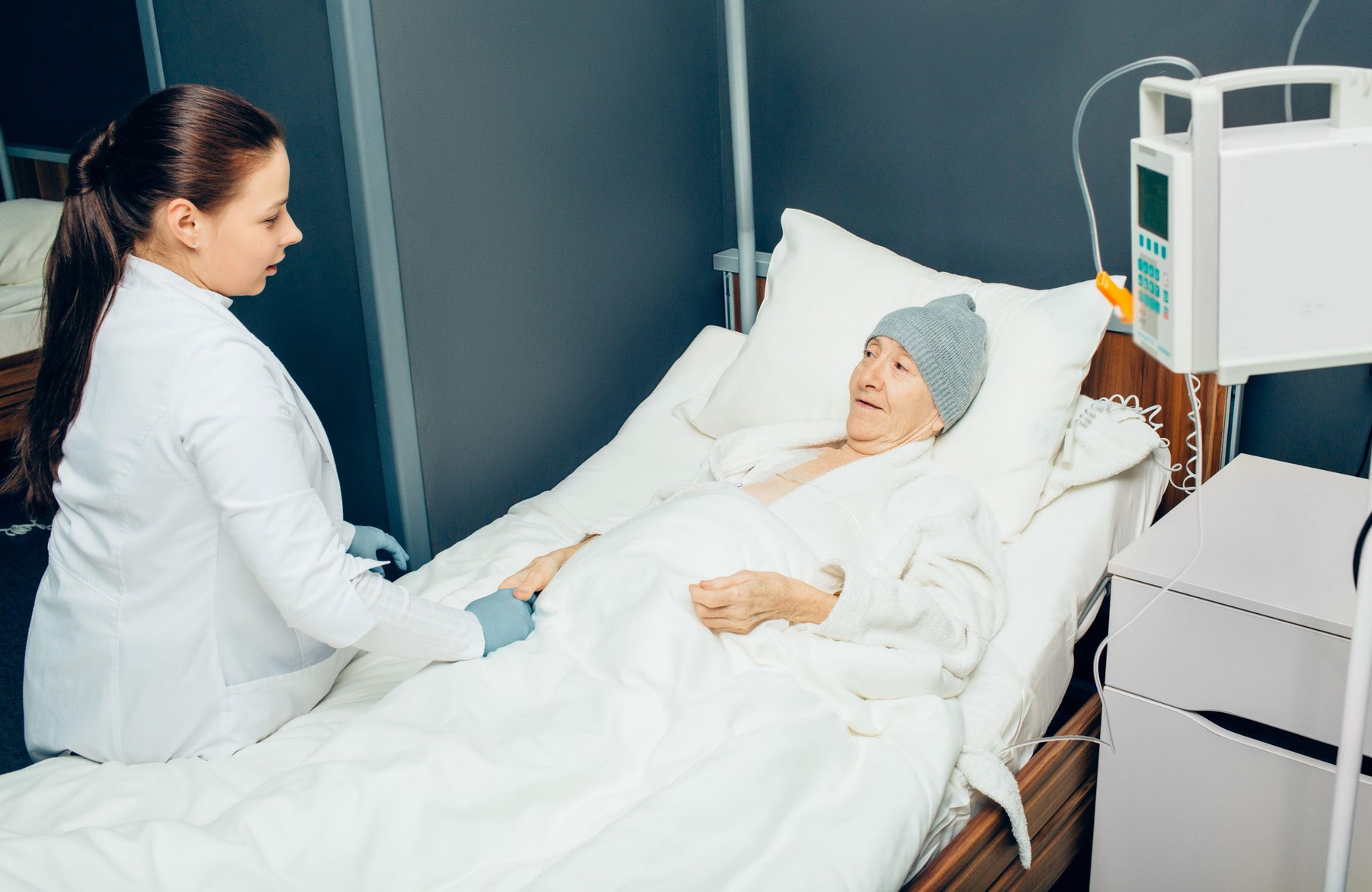 Doctor consults a woman patient in an oncology clinic. Cancer, Oncology. Cancer treatment with chemotherapy.