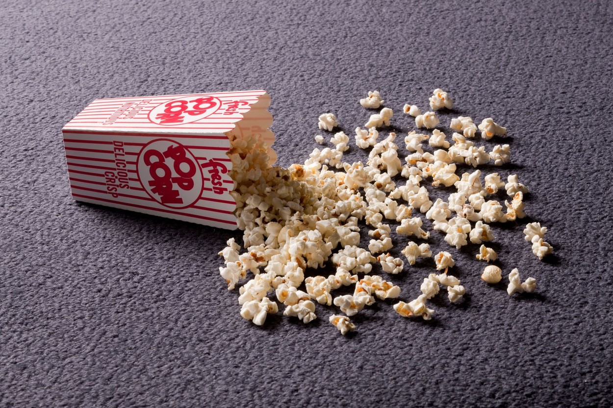 Popcorn spilling on floor