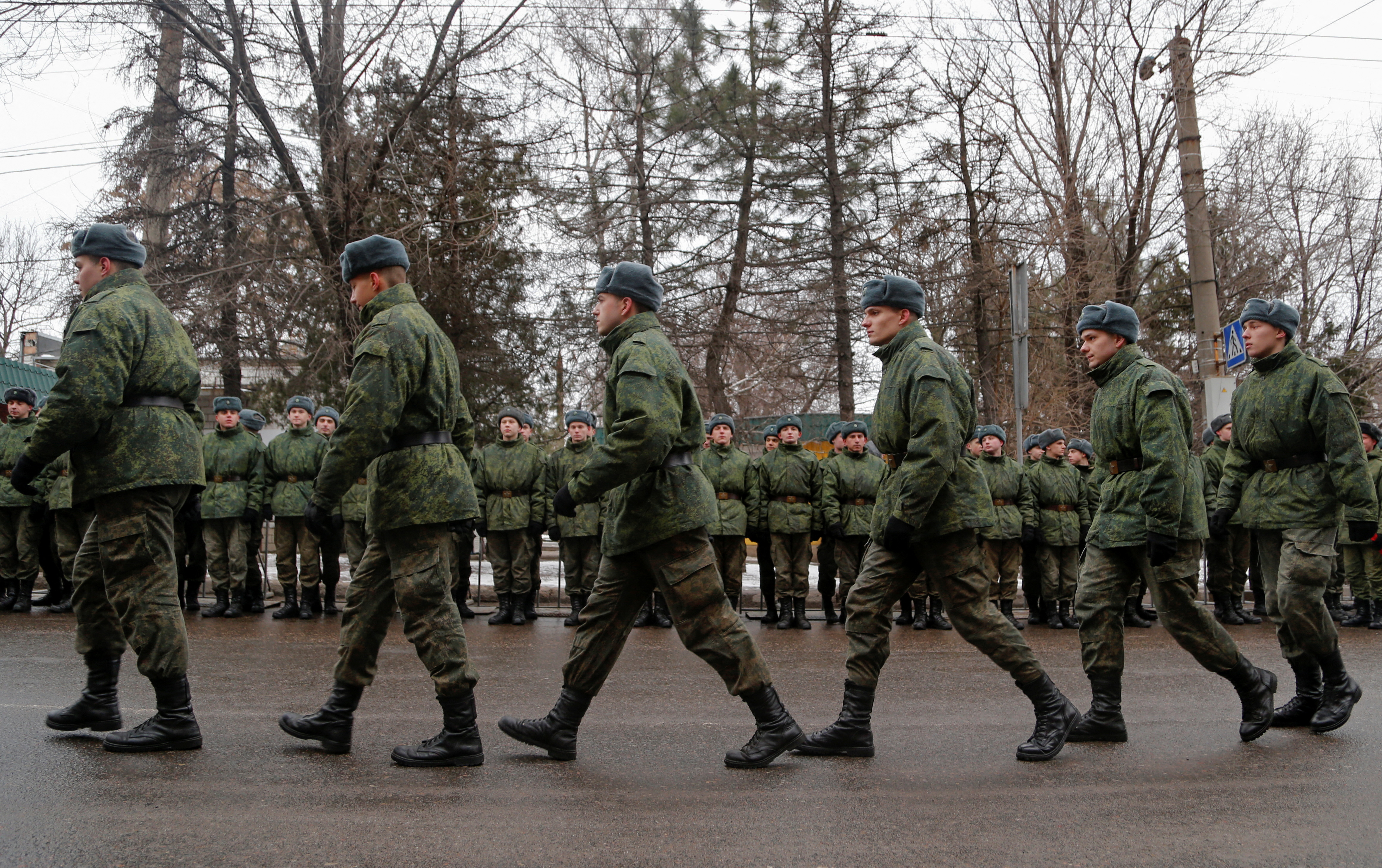 Cadets of the self-proclaimed Donetsk People's Republic walk during the ceremony in the rebel-controlled city of Donetsk
