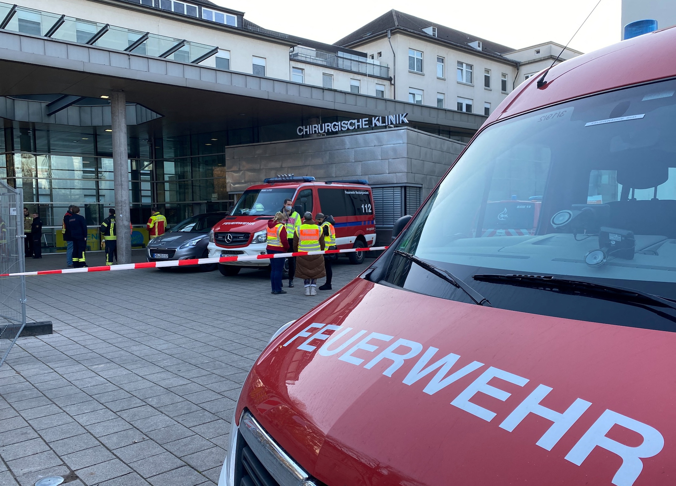 Police and firefighters secure the area at the premises of the Heidelberg university